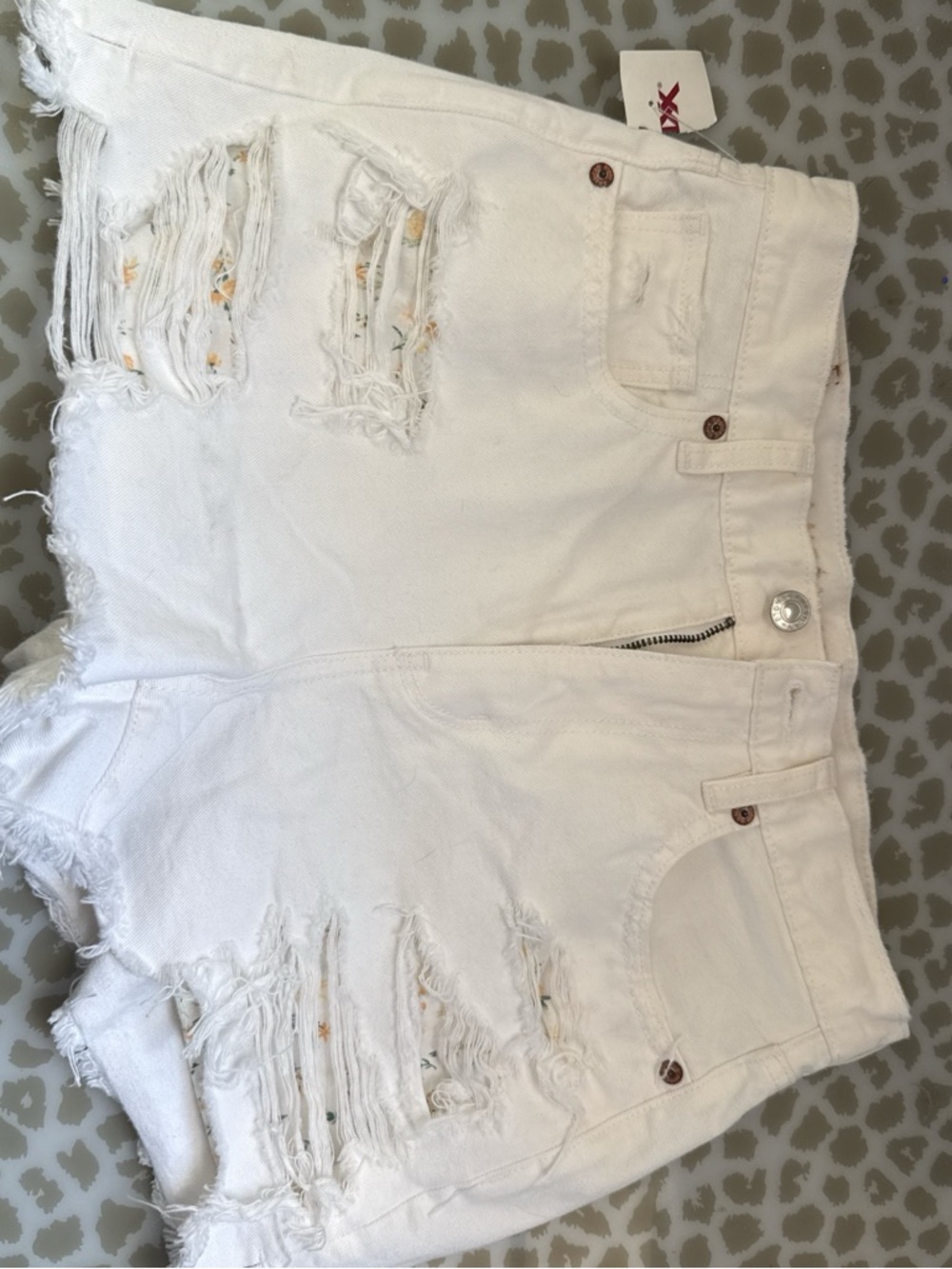 American Eagle Outfitters White Distressed Denim Shorts with Floral Underlay